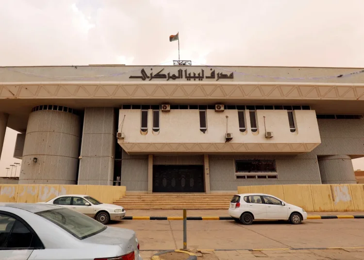Cars parked in front of Libya's Central Bank branch the southern city of Sebha on September 4, 2024. (AFP)