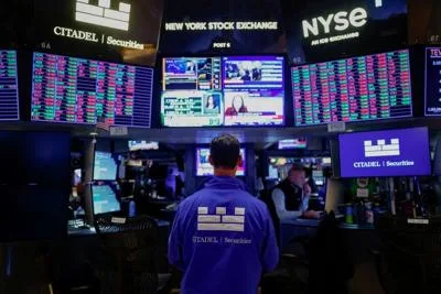 Wall Street slides as AI cash burn worries