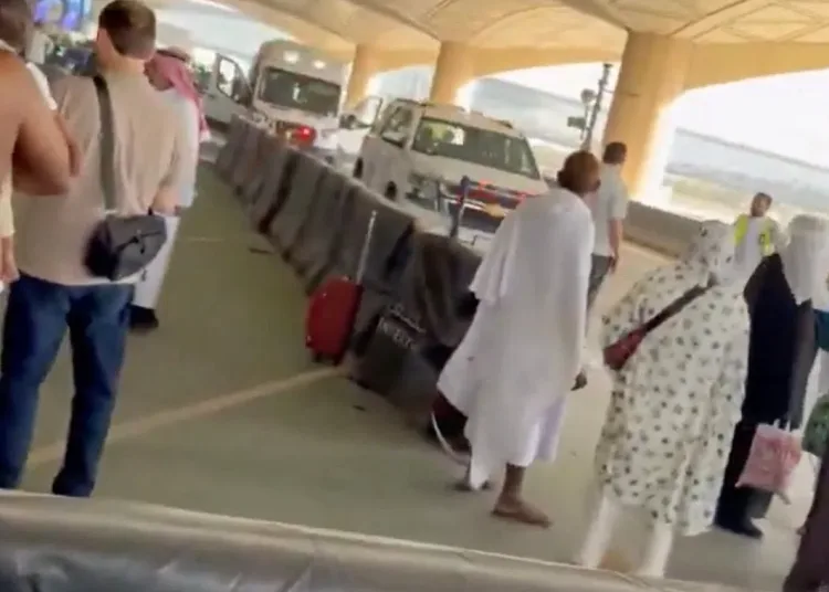 An ambulance is parked outside King Khalid International Airport after several people were wounded in an attack on the airport that forced a suspension of operations, according to Saudi Arabia's civil aviation authority, in Riyadh, Saudi Arabia, October 10, 2026, in this screengrab obtained from social media video. Social Media/via REUTERS