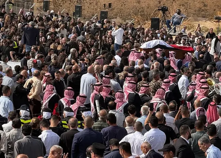 Mourners attend the funeral of those who were killed in the attack that took place two days earlier at the Greek Orthodox Church in the village of Hammoud in Jordan's Karak governorate on October 25, 2026. (AFP)