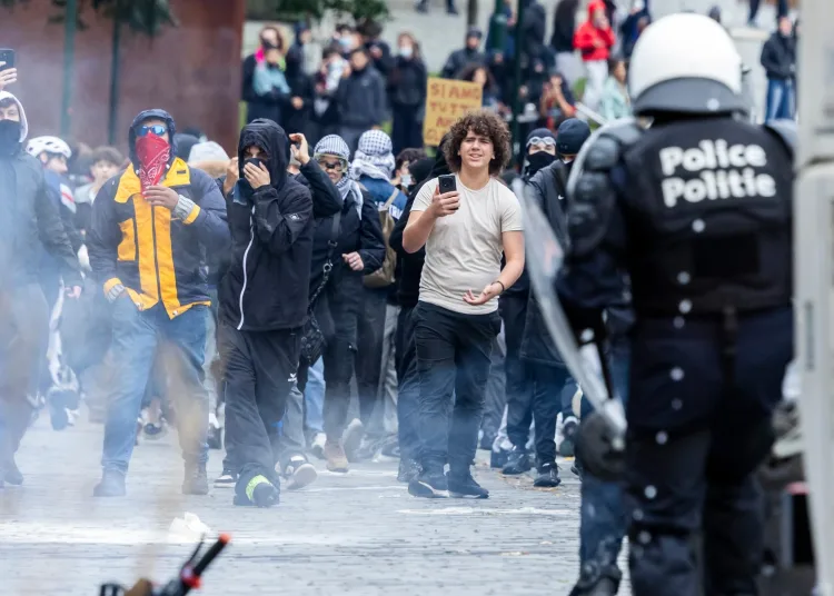 Protesters clash with police in Brussels 12 - Egyptian Gazette