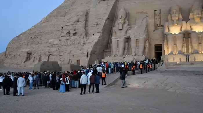 Sun illuminates Ramses II’s face at Abu Simbel before 7,000 visitors