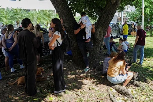 People gather in an open area after an earthquake struck near the southern coast of Panama, in Panama City, Panama, October 9, 2026. REUTERS/Enea Lebrun