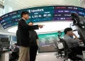 Asian shares mixed, Brent crude at $104 a barrel