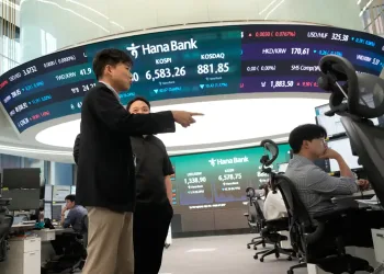 Asian shares mixed, Brent crude at $104 a barrel