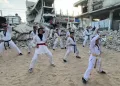 Gaza taekwondo athletes train amid rubble